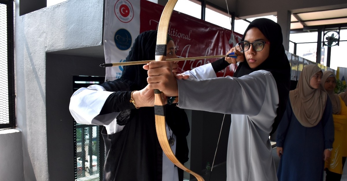 Instructor Adriana Amin Zahari trains a student.