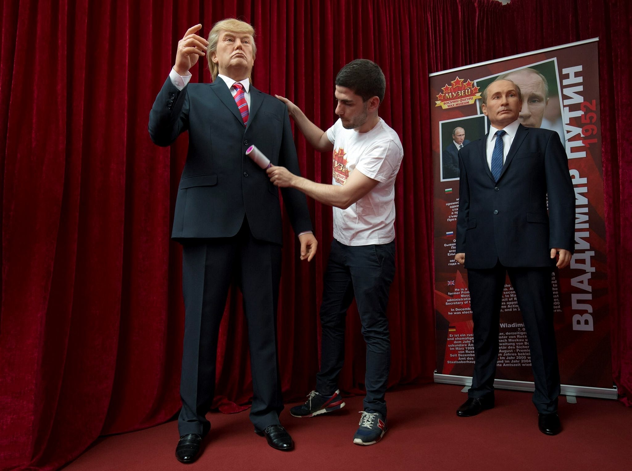 The wax models of US President Donald Trump, left, and Russian President Vladimir Putin, right, are displayed in Sofia, Friday March 31, 2017. (AP Photo)