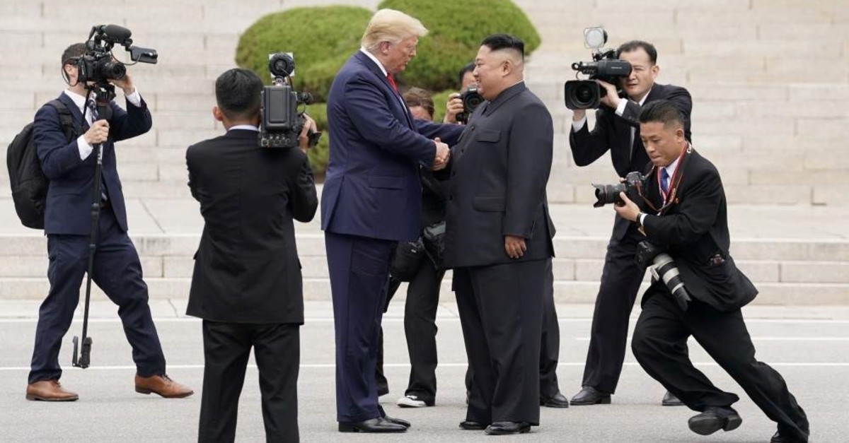 U.S. President Donald Trump meets with North Korean leader Kim Jong Un at the demilitarized zone separating the two Koreas, Panmunjom, June 30, 2019. (REUTERS Photo)
