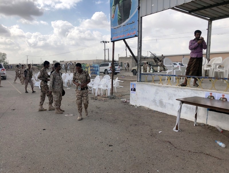 Soldiers inspect the scene of a Houthi drone attack at Yemeni government military parade in al-Anad air base, Lahaj province, Yemen, Jan. 10, 2019. (Reuters Photo)