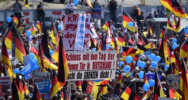 Far-right AfD supporters march in Berlin, face counter-protests - Daily ...