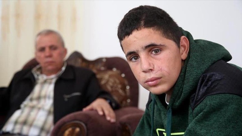 Mohammad Fadel al-Tamimi (R), 15, cousin of Palestinian resistance icon Ahed al-Tamimi. (AA Photo)