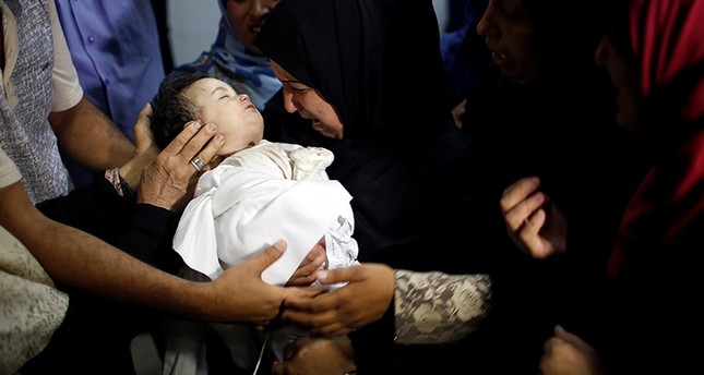 protests to resume in gaza after 61 palestinians killed by israeli