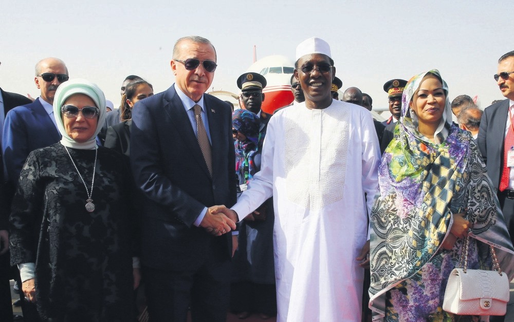 President Erdou011fan was welcomed by Chadian President Idriss Deby at the N'Djamena Airport, N'Djamena, Dec. 26.