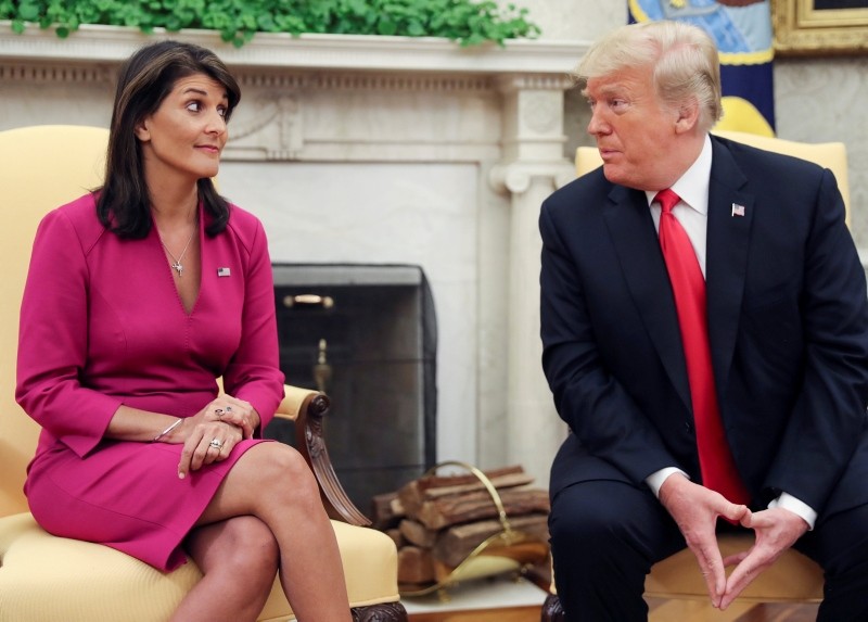 U.S. President Donald Trump talks with U.N. Ambassador Nikki Haley in the Oval Office of the White House after it was announced the president had accepted the Haley's resignation in Washington, U.S., October 9, 2018. (REUTERS Photo)