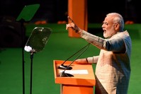Indian Prime Minister Narendra Modi gestures as he speaks during a traders national convention in New Delhi on April 19, 2019. (AFP Photo)