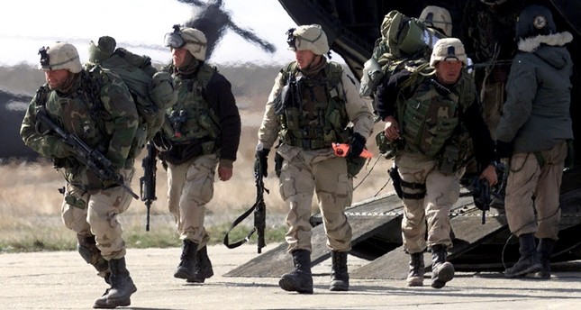 أرشيفية- مجموعة من الجنود الأمريكيين أثناء عودتهم من القتال في أفغانستان. رويترز
