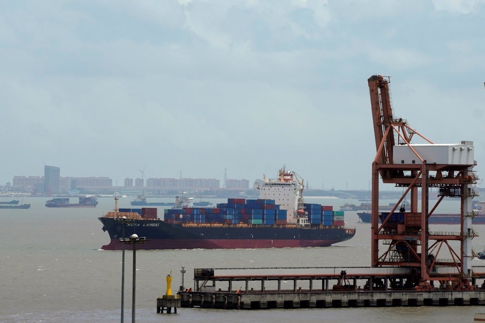 Shipping containers are seen at a port in Shanghai, China, July 10.