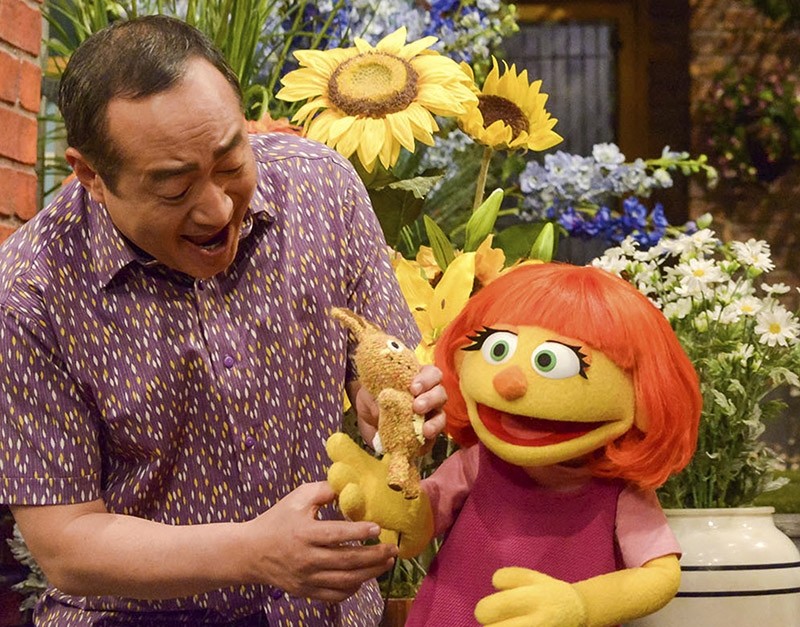 This image released by Sesame Workshop shows Julia, a new autistic muppet character debuting on the 47th Season of ,Sesame Street,, on April 10, 2017. (AP Photo)