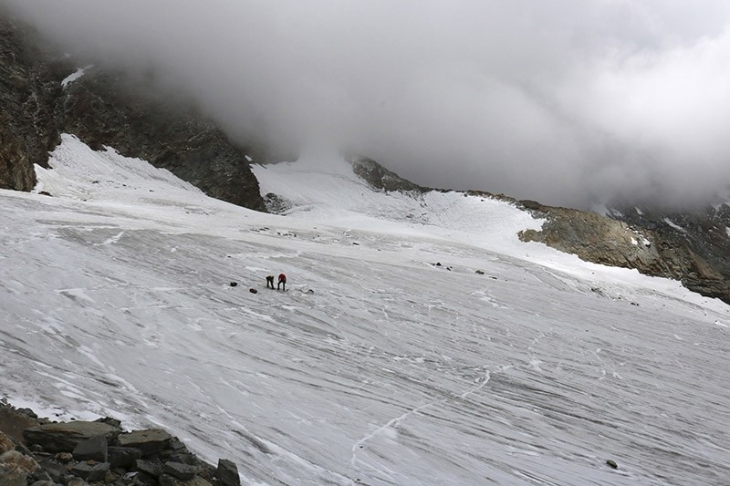 This undated  picture released by the police in canton Valais shows the place at Hohlaub Glacier near Saas Fee, Switzerland where the body of a German hiker was found. (AP Photo)