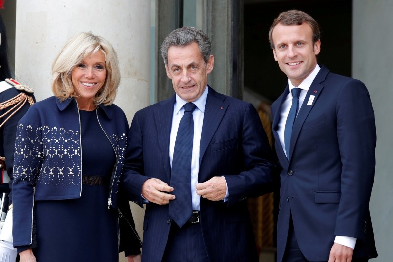 French President Emmanuel Macron (R) and his wife Brigitte Macron greet former French president Nicolas Sarkozy for a ceremony at the Elysee Palace, September 15, 2017. (Reuters Photo)