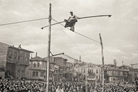 Two acrobats in Little Hagia Sophia neighborhood, Fatih, Istanbul, around 1930. Yapi Kredi Historical Archive.