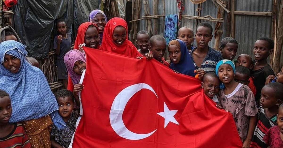 A group of Somali children hold a Turkish flag in this undated photo. (AA Photo)