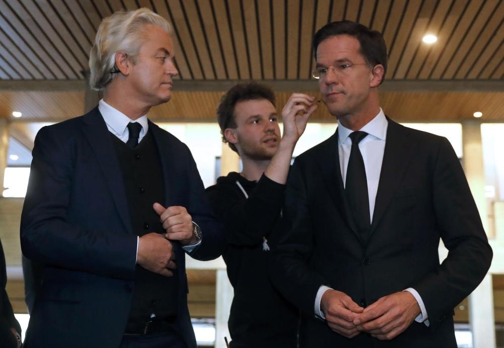 Geert Wilders of the PVV and Dutch PM Rutte (R) of the VVD take part in the debate in Rotterdam, on Monday.