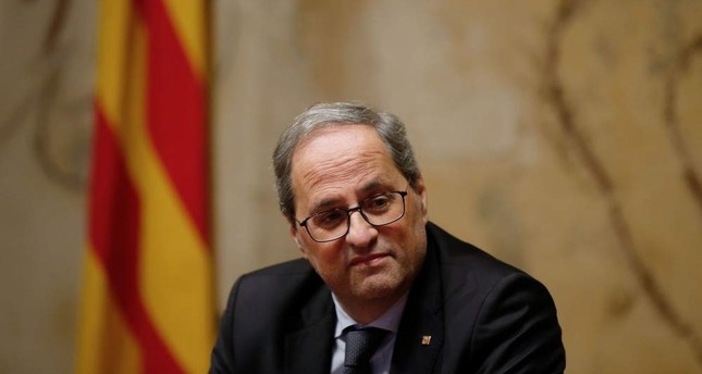 Catalan regional president, Quim Torra, presides over an extraordinary meeting with his cabinet at the government headquarters in Barcelona, Jan. 3, 2020. (AFP Photo)