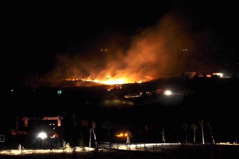 In this Sept. 5, 2012 file photo fire is seen burning after an explosion at an ammunition depot in Afyonkarahisar, Turkey. (AA Photo)