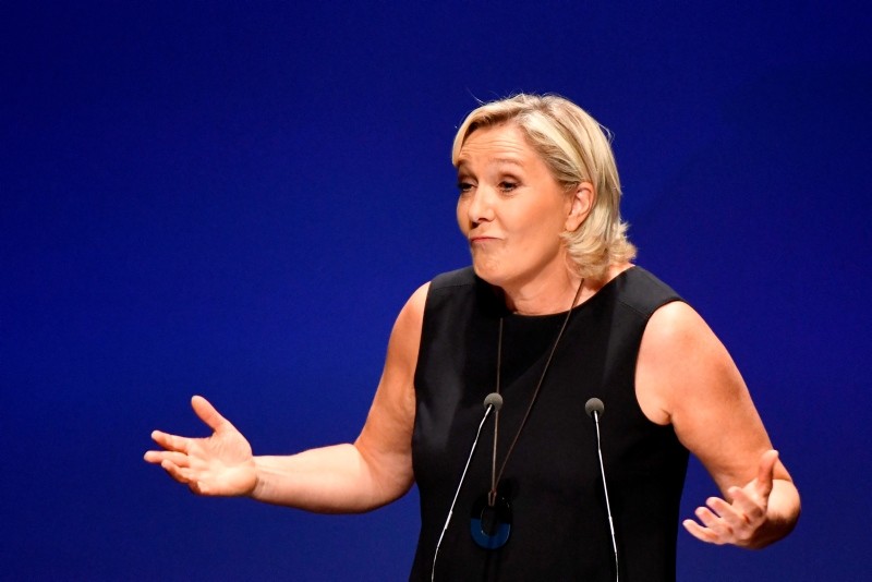 Leader of France's National Rally far-right political party Marine Le Pen gestures as she delivers a speech at a meeting in Fru00e9jus, southern France, Sept. 16, 2018. (AFP Photo)