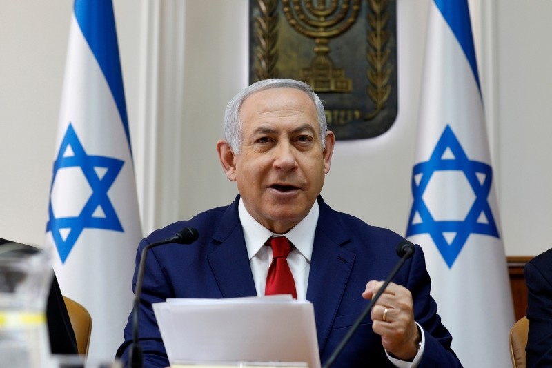 Israeli Prime Minister Benjamin Netanyahu opens the weekly cabinet meeting at the prime minister's office in Jerusalem, Sunday, Jan. 6, 2019. (AP Photo)