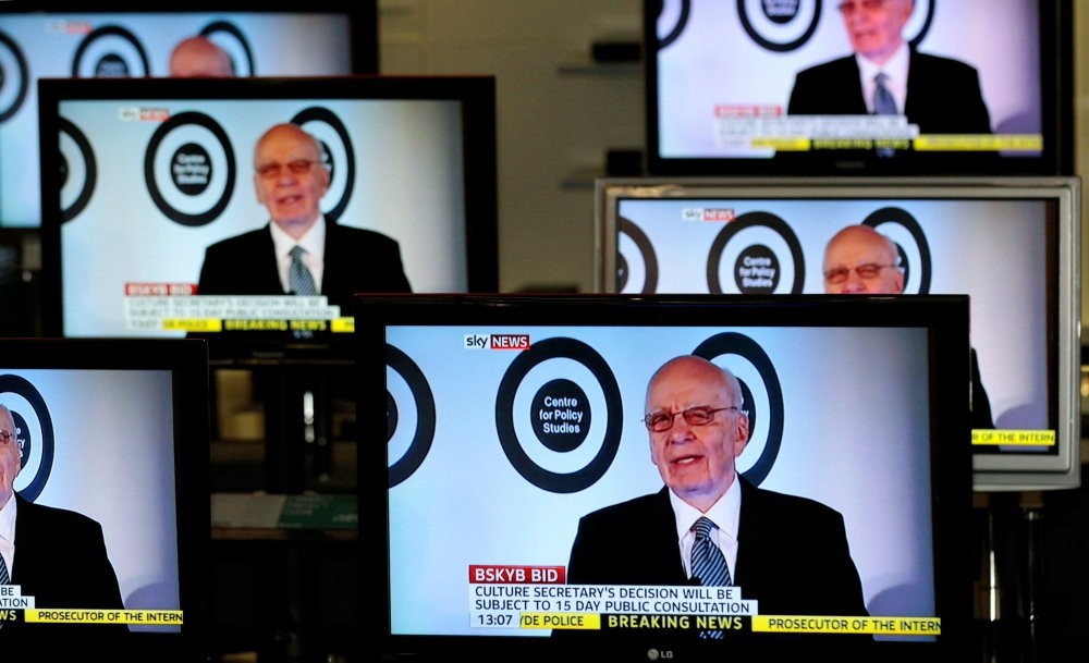 The current Executive Chairman of News Corporation and Executive Co-Chairman of Twenty-First Century Fox, Rupert Murdoch is seen talking on Sky News on television screens in an electrical store in Edinburgh.