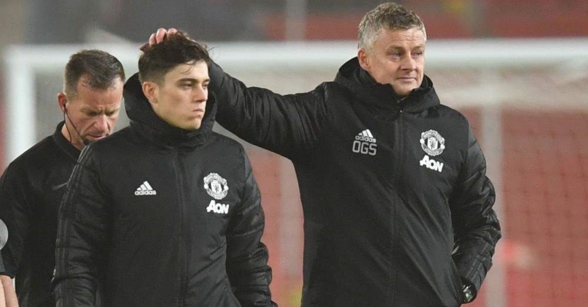 Solskjaer consoles his player after losing a match against Burnley in Manchester, Jan. 22, 2020. (AFP Photo)