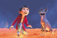 Disney-Pixar characters Miguel, voiced by Anthony Gonzalez, left, and Dante in a scene from the animated film, ,Coco,, one of the largest U.S. productions ever to feature an almost entirely Latino cast.