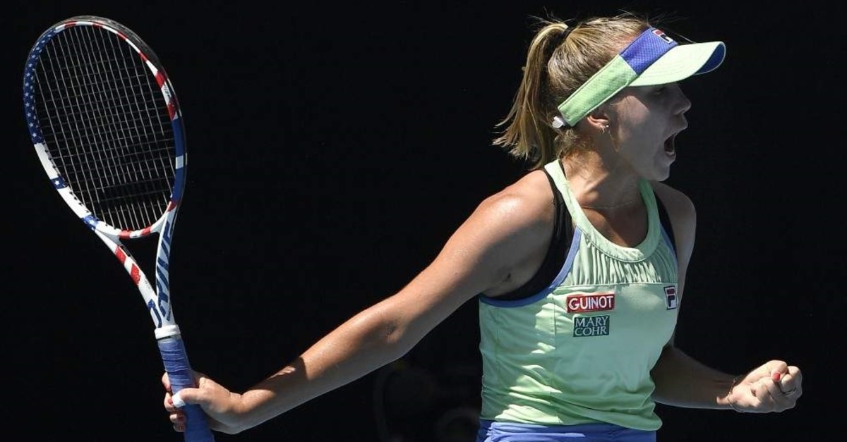 Sofia Kenin of the U.S. reacts after winning the first set against Australia's Ashleigh Barty during their semifinal match at the Australian Open tennis championship in Melbourne, Australia, Thursday, Jan. 30, 2020. (AP Photo)