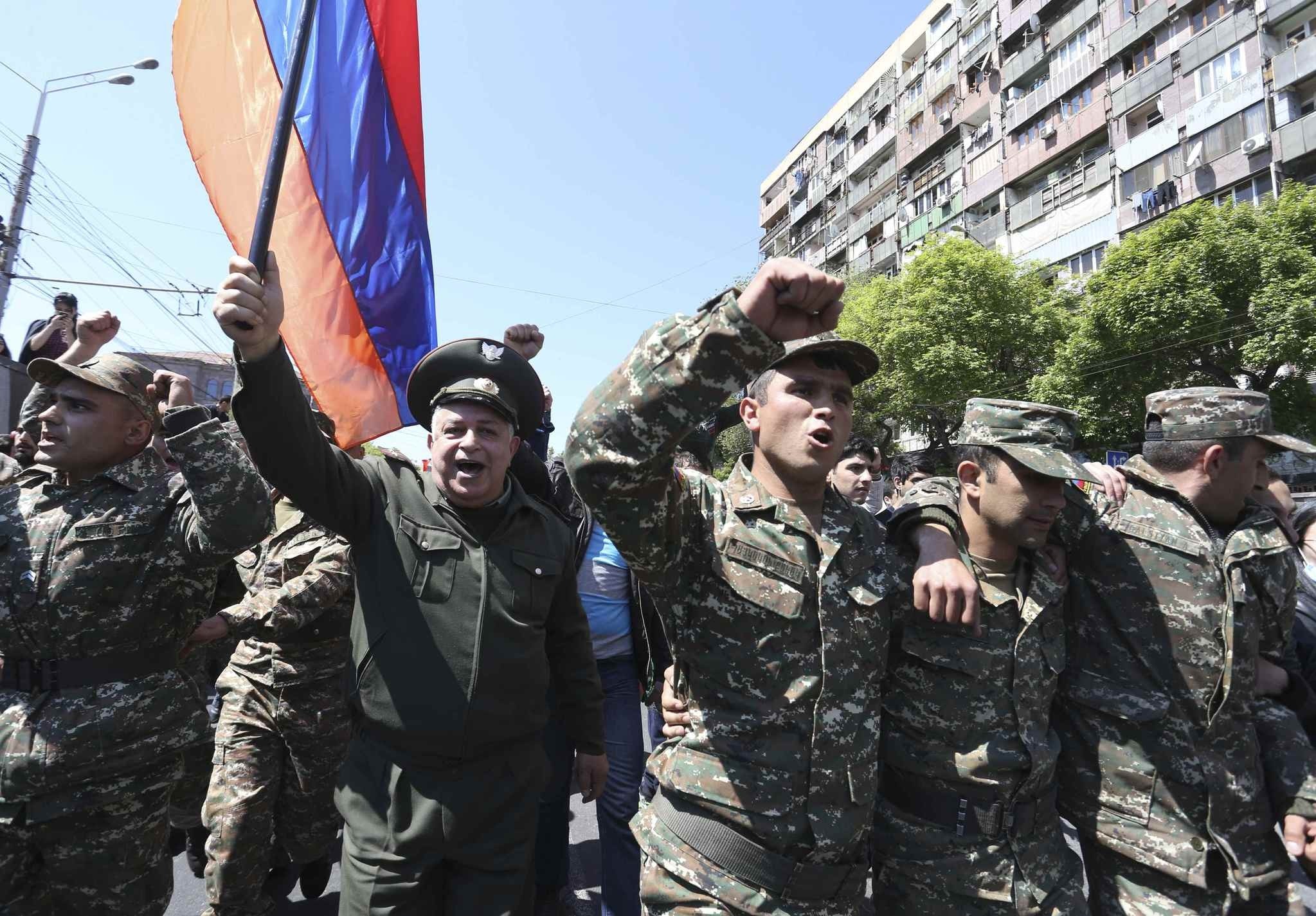 People march during a protest against the appointment of ex-president Serzh Sarksyan as the new prime minister in Yerevan, Armenia April 23, 2018. (REUTERS Photo)