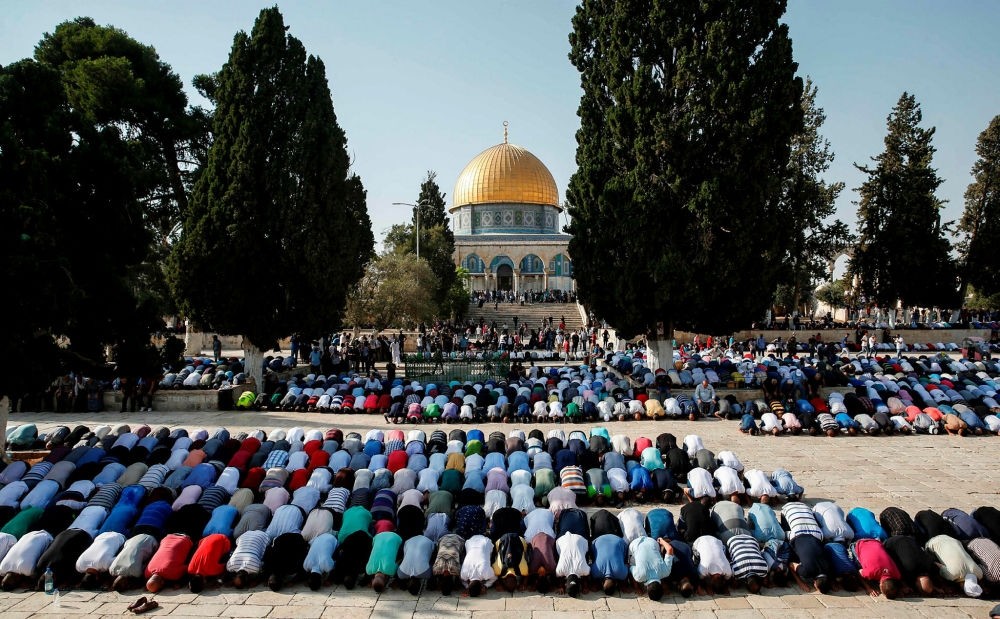 Palestinian Muslims pray inside the Haram al-Sharif compound, known to Jews as the Temple Mount, in the old city of Jerusalem.