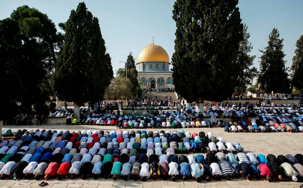 Palestinian Muslims pray inside the Haram al-Sharif compound, known to Jews as the Temple Mount, in the old city of Jerusalem.