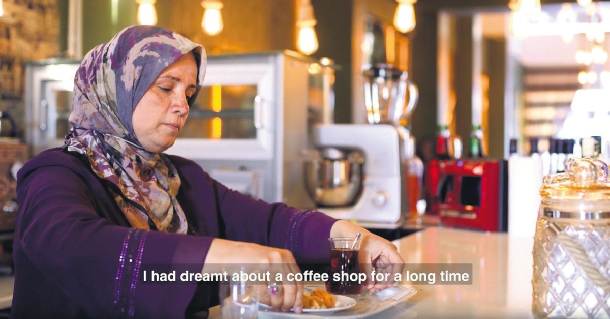 A screenshot from one of the videos shows a refugee speaking about her experience in Turkey where she now runs a coffee shop.