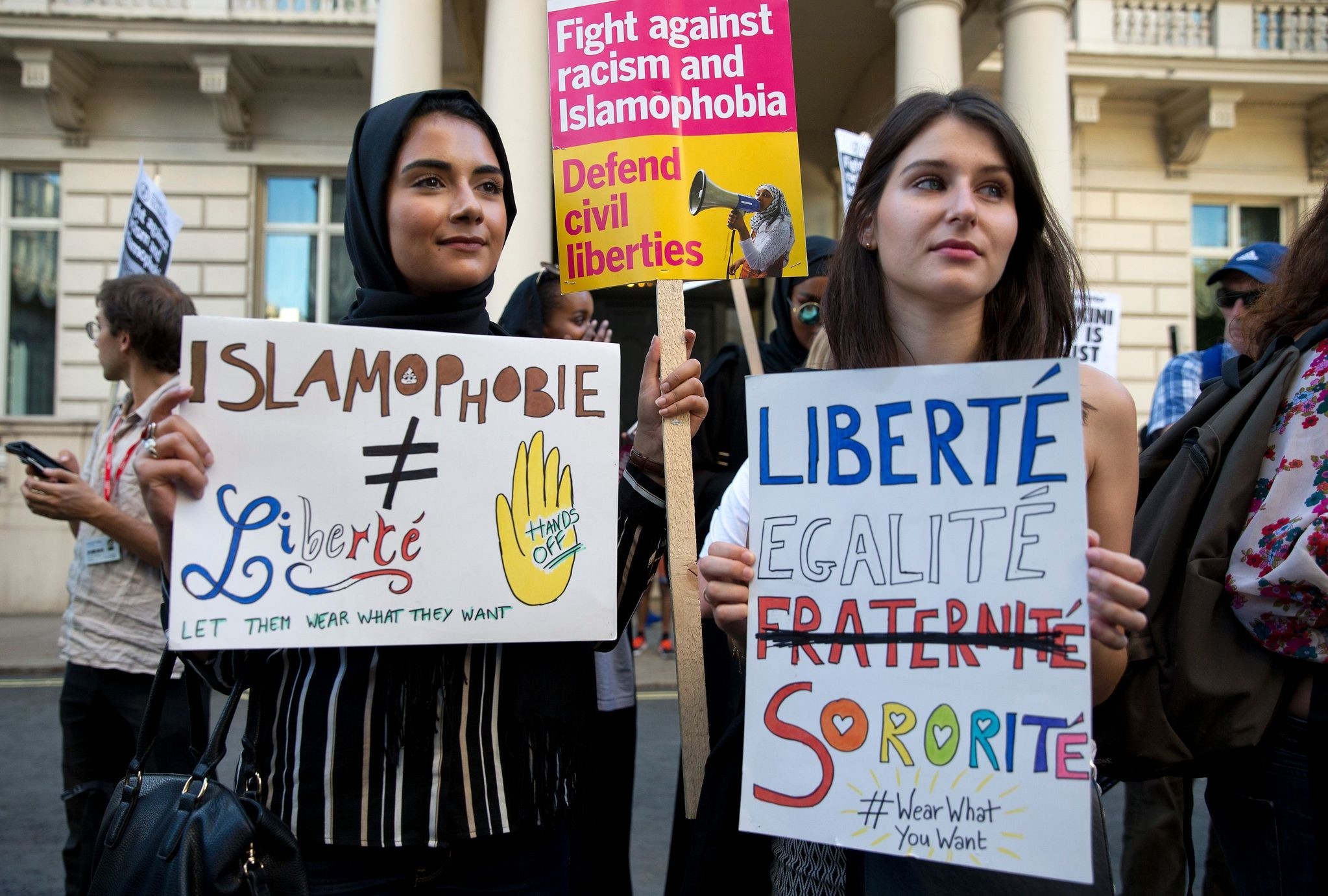 Women joining a demonstration organised by ,Stand up to Racism, outside the French Embassy in London on Aug. 26, 2016 against the burkini ban on French beaches. (AFP Photo)