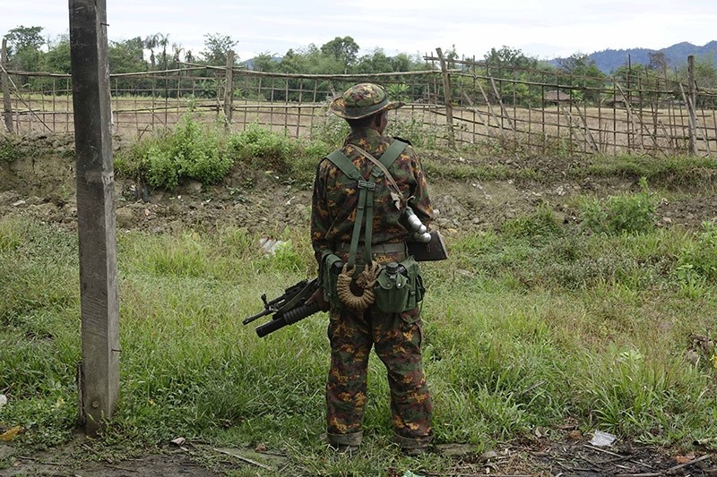 An armed soldier stand guards in Maungdaw township, Rakhine State, western Myanmar, 02 January 2018. (EPA Photo)