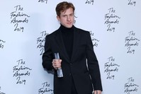 Bottega Veneta Creative Director Daniel Lee poses after the company won the Brand of the Year award at The Fashion Awards 2019 in London on Dec. 2, 2019. (AFP Photo)