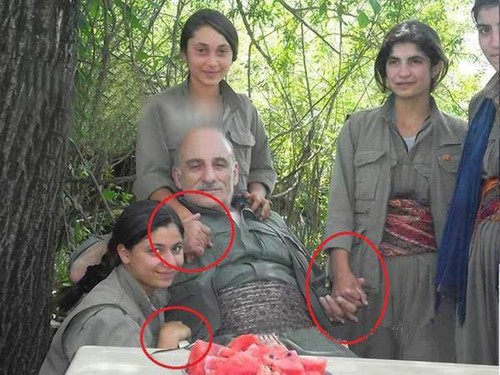 PKK leader Duran Kalkan with young girls.