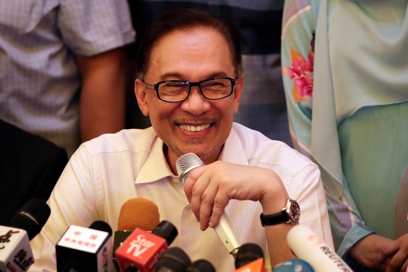 Malaysia's reformist icon Anwar Ibrahim smiles during a press conference at his residence in Kuala Lumpur, Malaysia, May 16, 2018. (AP Photo)