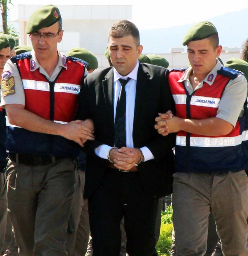 Gendarmerie officers escort Haydar Murat u00d6zden to court. u00d6zden transported would-be assassins of President Erdou011fan to the hotel where he had been staying during the coup attempt.