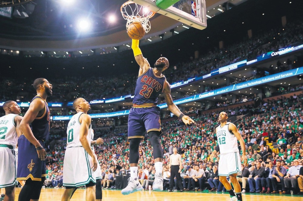 LeBron James #23 of the Cleveland Cavaliers dunks in the third quarter against the Boston Celtics