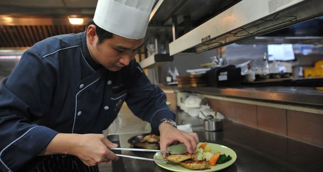 This photo taken on January 19, 2018 shows a chef preparing a Halal meal at the Gaia Hotel, which caters to tourists from Muslim-dominant countries, in the Beitou district near Taipei. (AFP Photo)