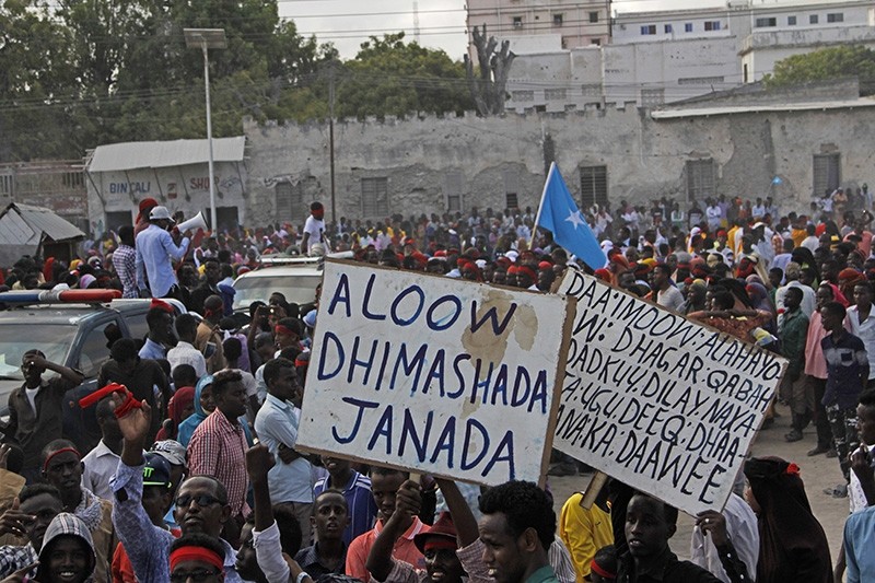 Somali protesters march in solidarity with the victims of Saturday's bombing, defying al-Shabaab. (AP Photo)