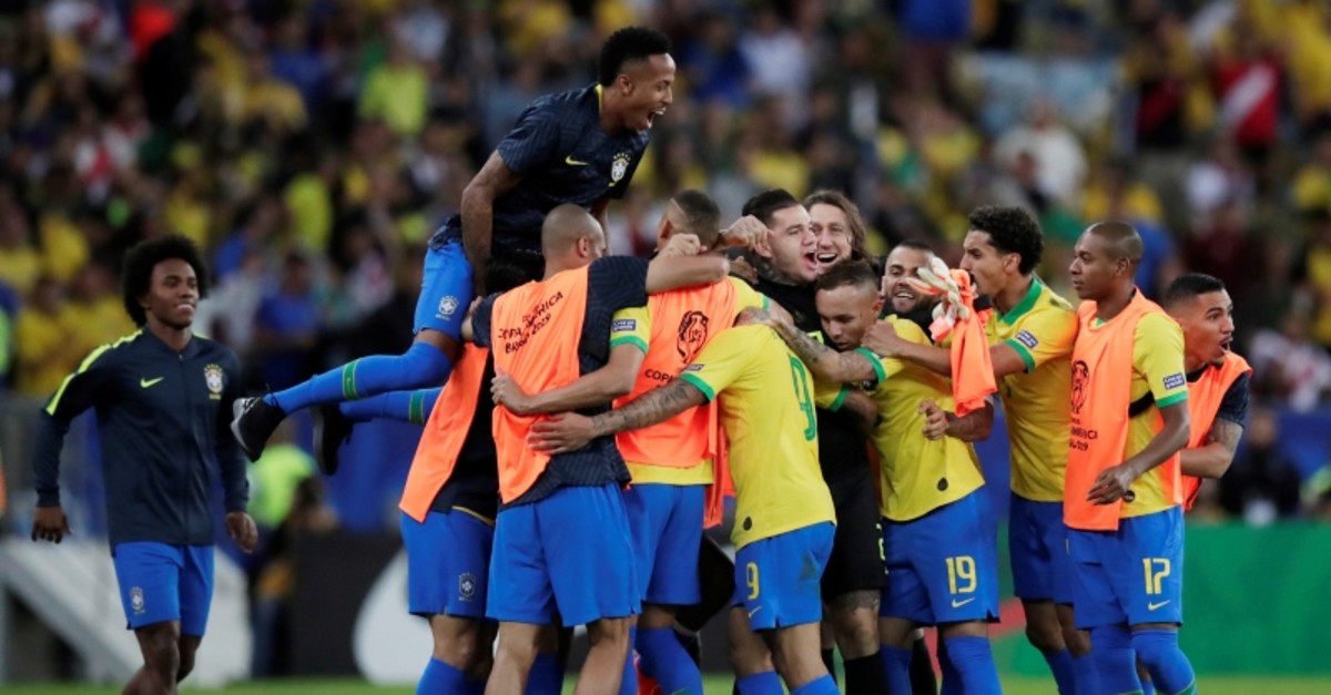 Brazil's Gabriel Jesus celebrates scoring their second goal with team mates (Reuters Photo)