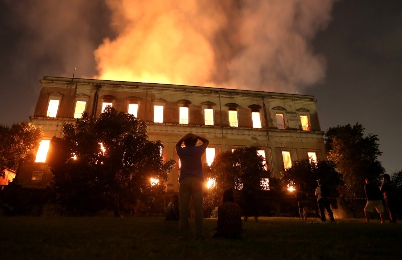 People watch as a fire burns at the National Museum of Brazil in Rio de Janeiro, Brazil September 2, 2018. (Reuters Photo)
