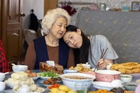 Zhao Shuzhen (left) and Awkwafina in a scene from ,The Farewell., (AP Photo)