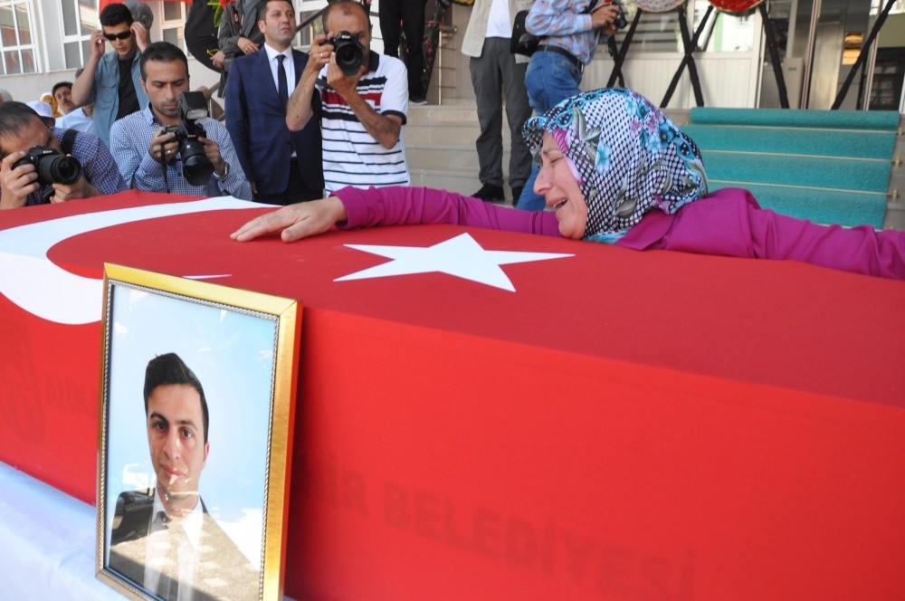 The funeral of Necmettin Yu0131lmaz, 23, was a teacher in u015eanlu0131urfa before he was kidnapped and killed by the PKK.