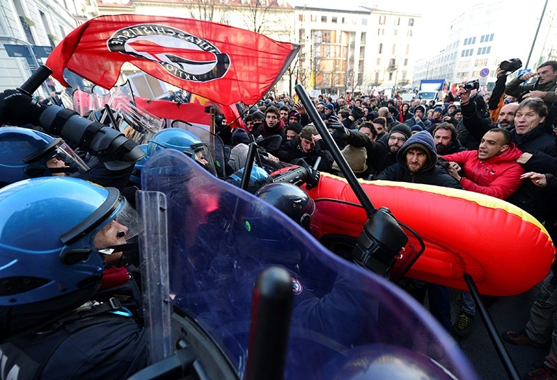 Demonstrators scuffle with police during an anti-fascism demonstration in Milan, Italy, Feb. 24, 2018 (Reuters Photo)