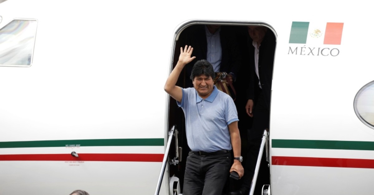 Bolivia's ousted President Evo Morales waves during his arrival to take asylum in Mexico, in Mexico City, Mexico, November 12, 2019. (Reuters Photo)