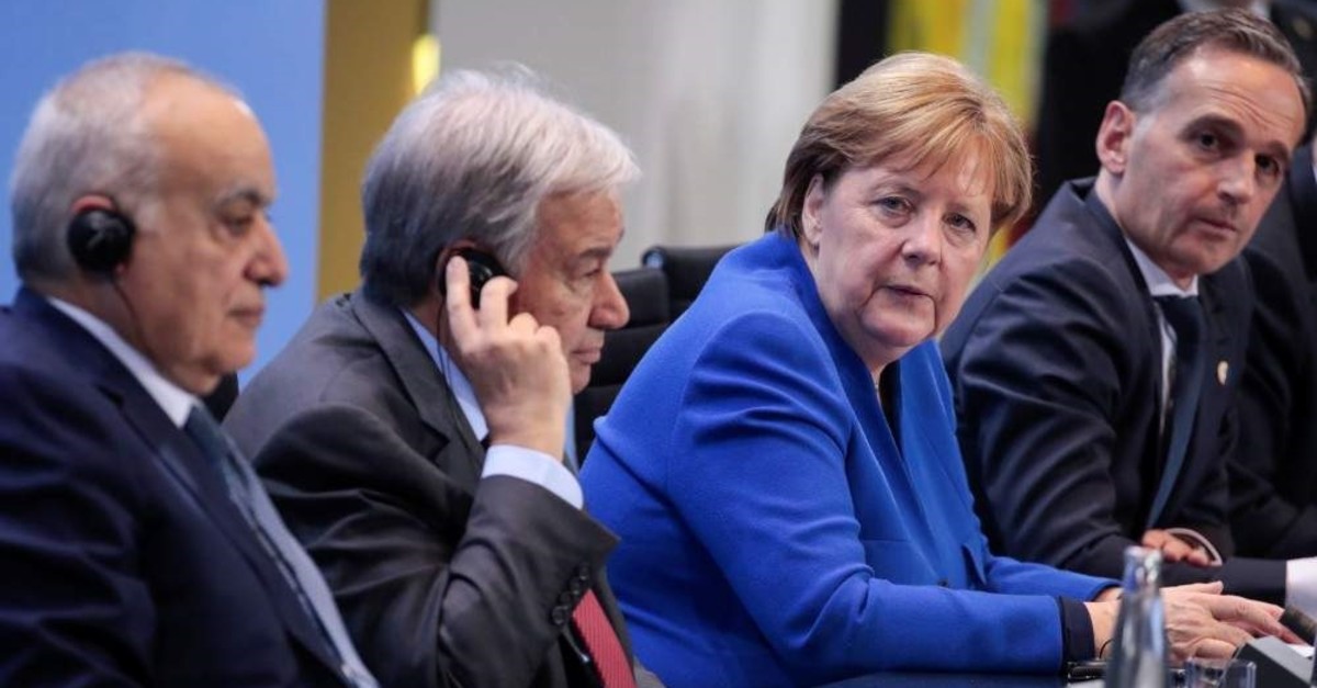Special Representative and Head of the United Nations Support Mission in Libya (UNSMIL) Ghassan Salame; Secretary-General of the United Nations (UN) Antonio Guterres; German Chancellor Angela Merkel and German Foreign Minister Heiko Maas give a press conference at the end of a Peace summit on Libya at the Chancellery in Berlin, Jan.19, 2020. (AFP PHOTO)