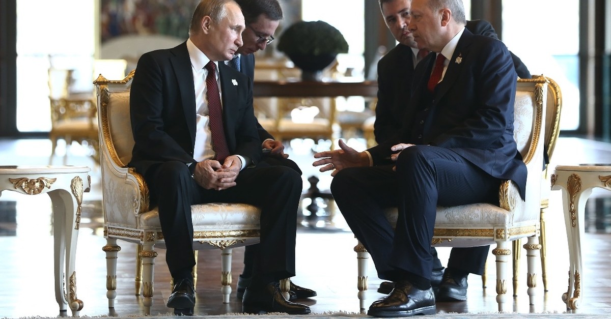 President Recep Tayyip Erdou011fan and his Russian counterpart Vladimir Putin (L) during a talk ahead of the inauguration ceremony of the Akkuyu Nuclear Power Plant Project, Ankara, April 3, 2018. 