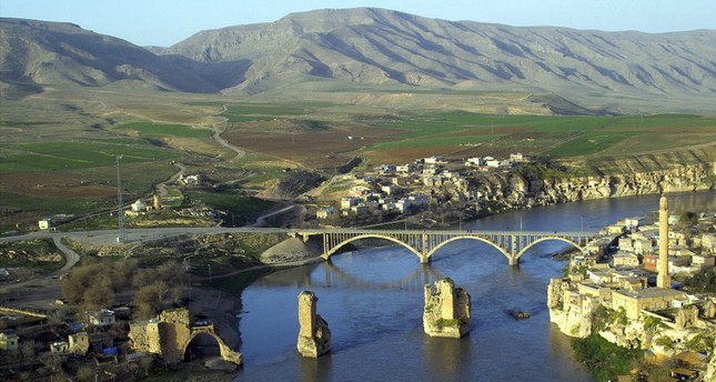 Archaeologists, engineers race to save ancient tomb from being submerged