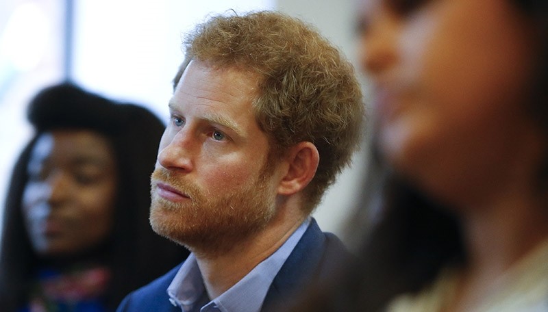 This is a  Monday, Dec. 19, 2016 file photo of Britain's Prince Harry listens to a seminar for members of staff during a visit to the Mix in London. (AP Photo)