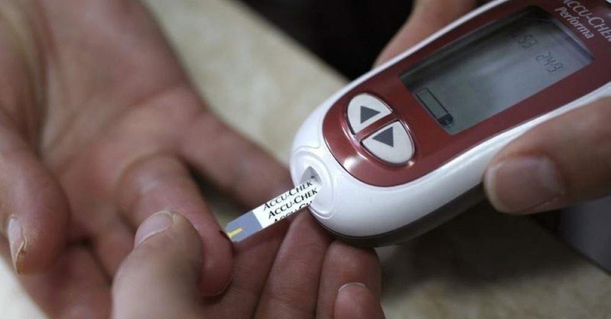 A patient takes a blood glucose test. (Reuters Photo)